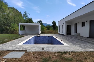 A modern one-story house with a swimming pool and a summer kitchen is for sale, Kršan