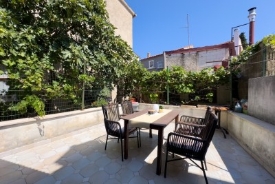 We are selling a house with office space in the center of Medulin!