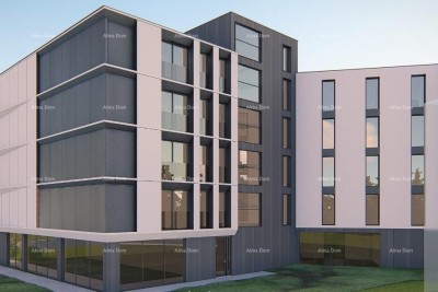 Apartments for sale in a residential and commercial building with a sea view, center of Umag!