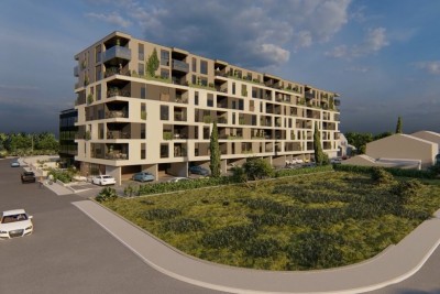 Edificio residenziale moderno con ascensore, vicino al centro.