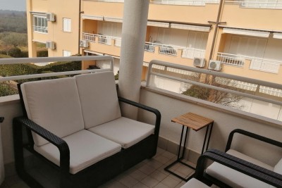 An apartment with a sea view is for sale in Zambratija, Umag