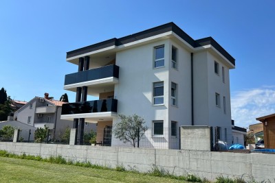 Moderner dreizimmerwohnung mit großer Terrasse und 2 Parkplätzen