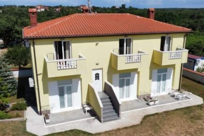 Umag. A beautiful house with six apartments.