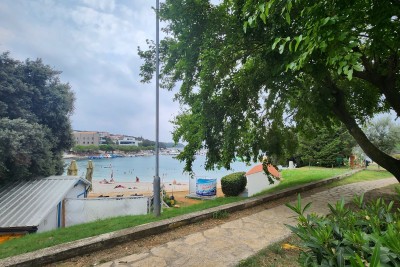 Peščena uvala, prva vrsta do morja. Apartma s pogledom na morje.
