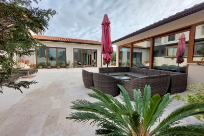 Modern house with two apartments, indoor pool and large yard