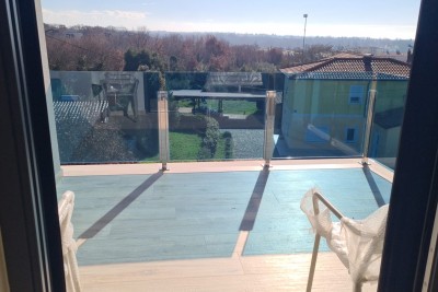 Modern apartment with parking space and storage in block F, near Umag!