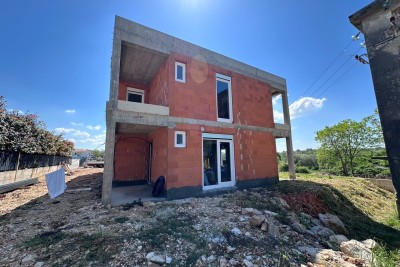 Umag- For sale: semi-detached house in rough construction phase.
