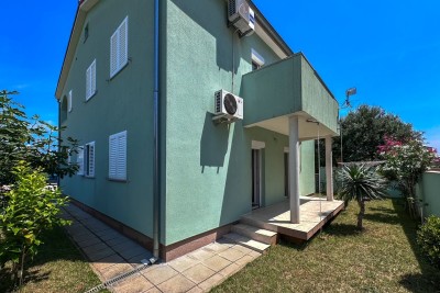 We are selling a house with two apartments in Valbandon.