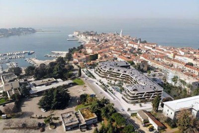 Poreč, stambeno poslovni objekt u gradnji sa apartmanima i podzemnim garažama