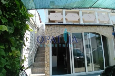 House with two apartments - second row to the sea