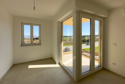 We are selling an apartment with a large garden in Barban.