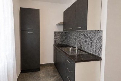 Renovierte Wohnung im Zentrum von Pula, 50 m² mit Fußbodenheizung und modernem Design