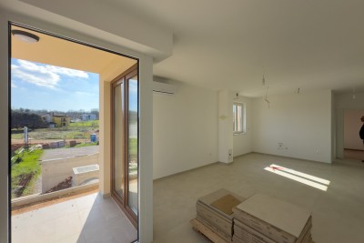 We are selling an apartment with a large garden in Barban.