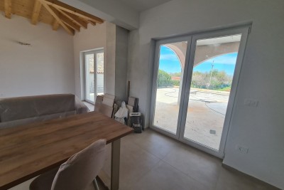 Elegant villa in a peaceful setting near the sea with views of vineyards and olive groves.